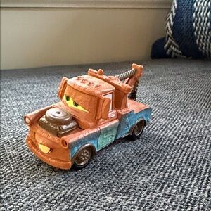 Rustic Brown and Blue Tonies Mater character Tow Truck